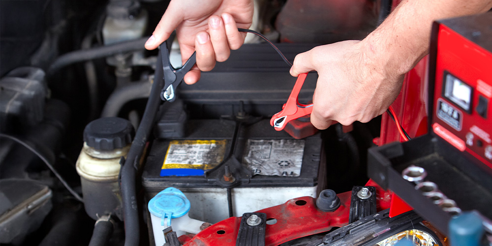 Image of a Car Battery Being Fixed